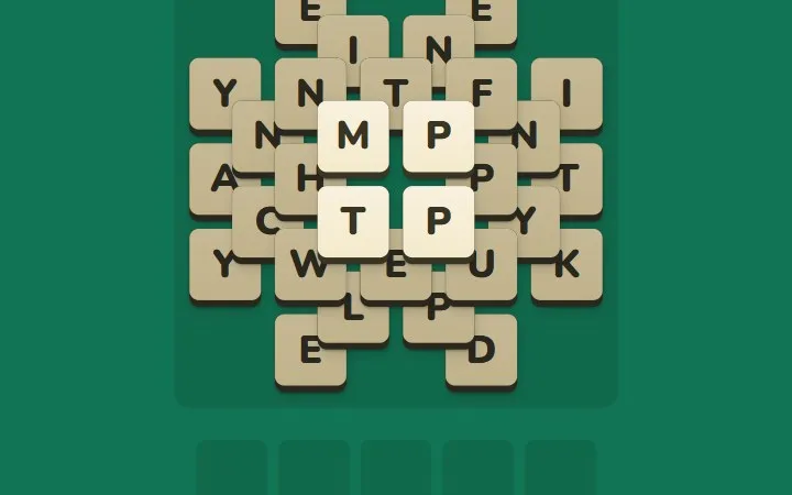 Stackdown board showing layered beige letter tiles on a green background